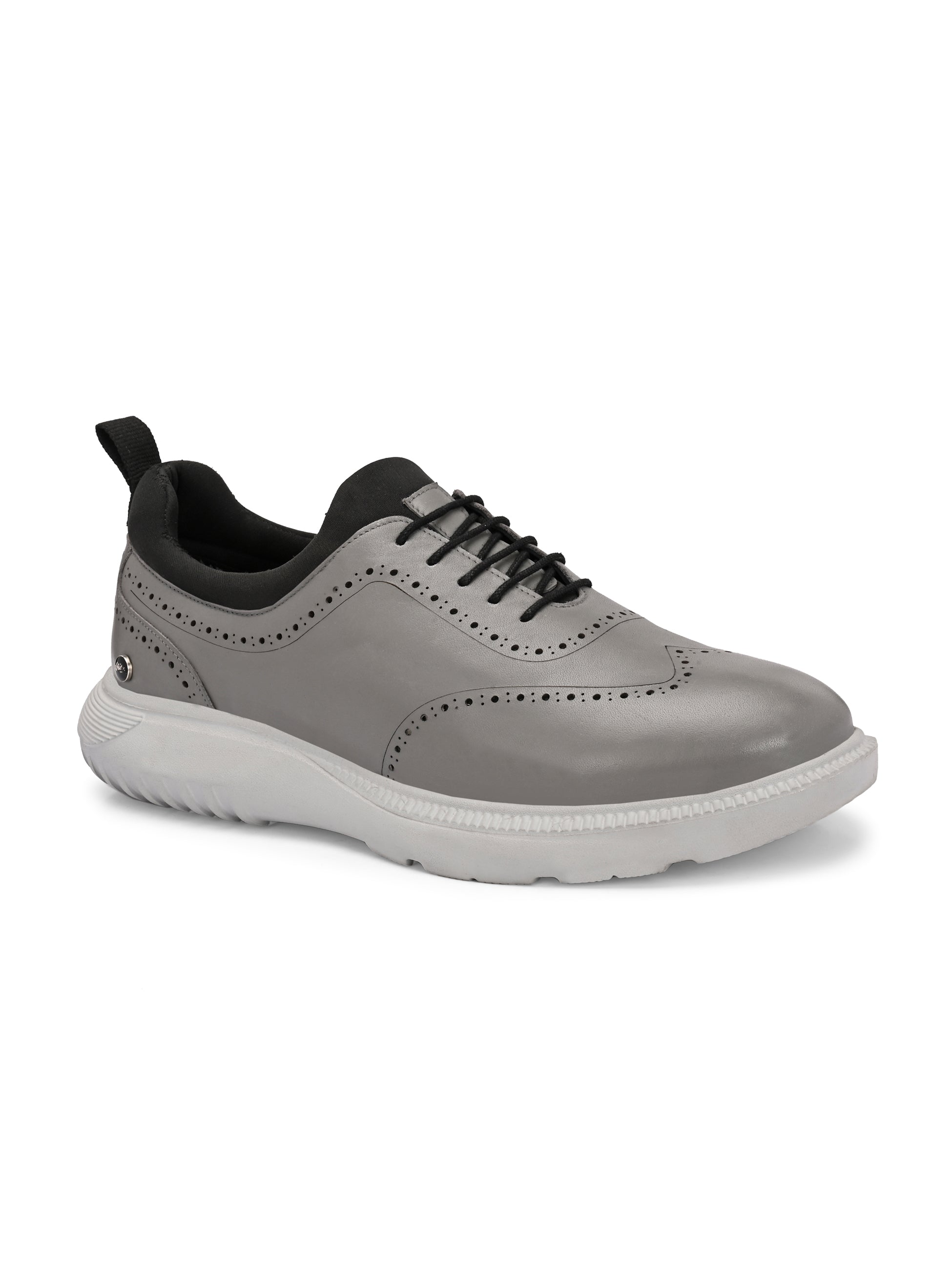 Trossard Cloud Leather Sneakers - The Heels India