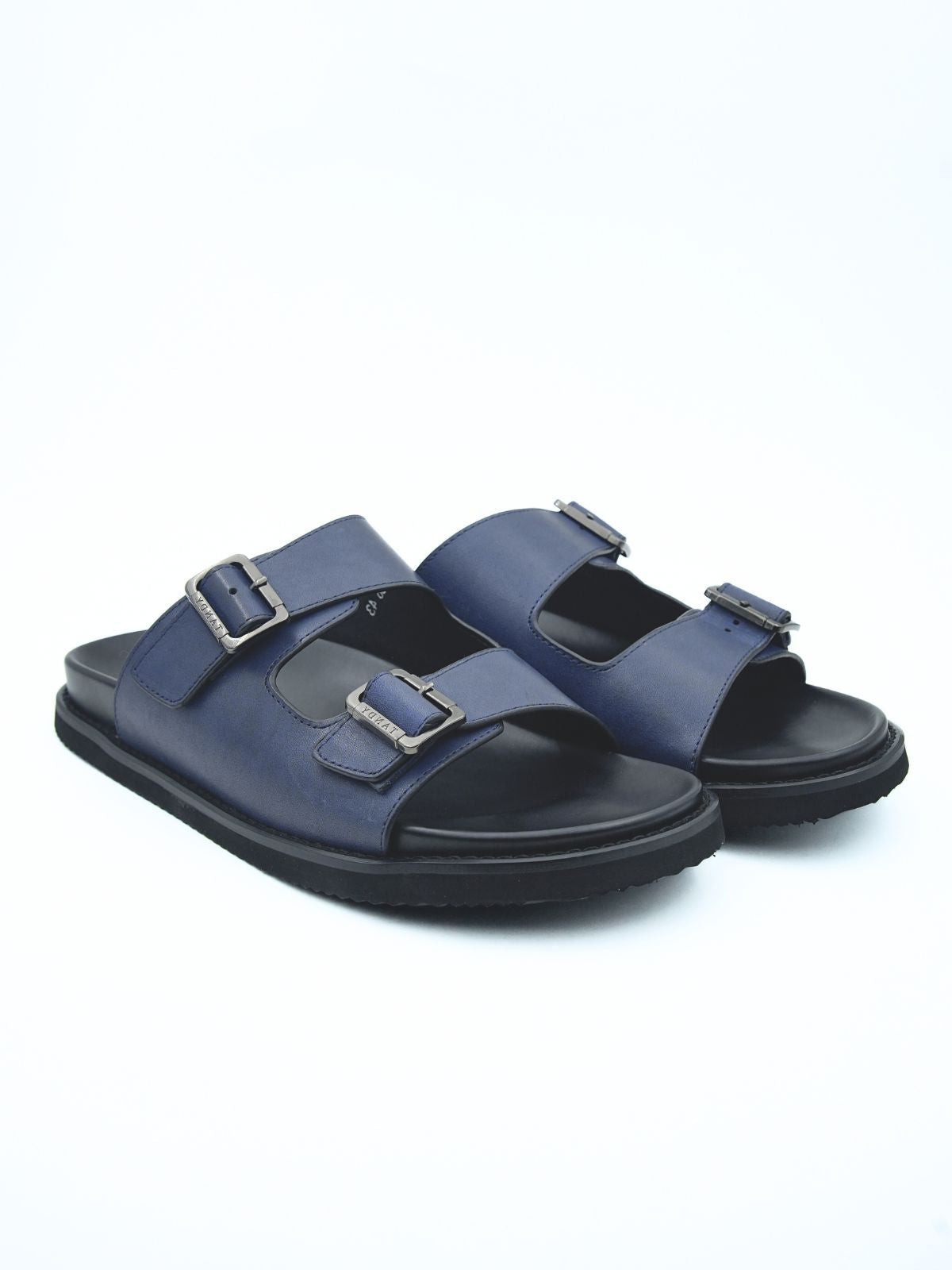Pair of blue sandals with black soles on a white background