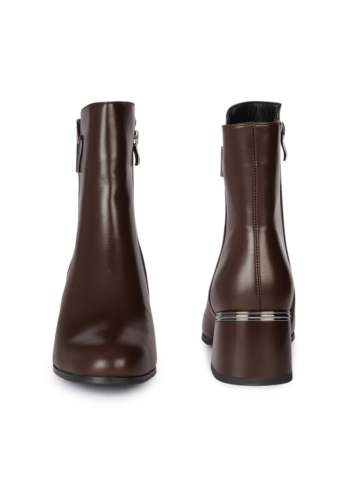 Pair of brown leather ankle boots on a white background