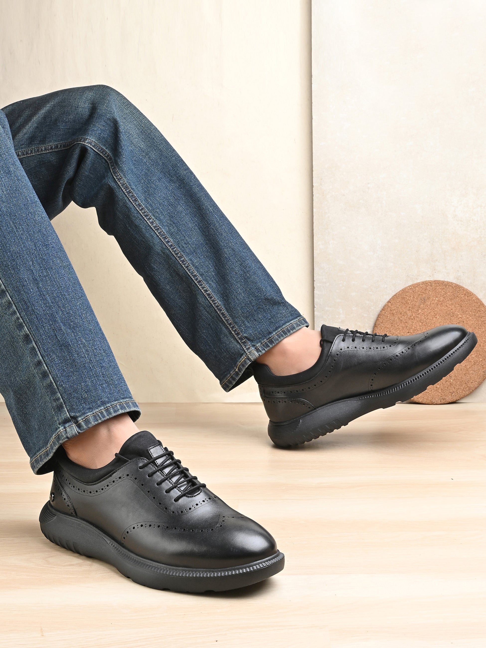 Trossard Cloud Leather Sneakers - The Heels India