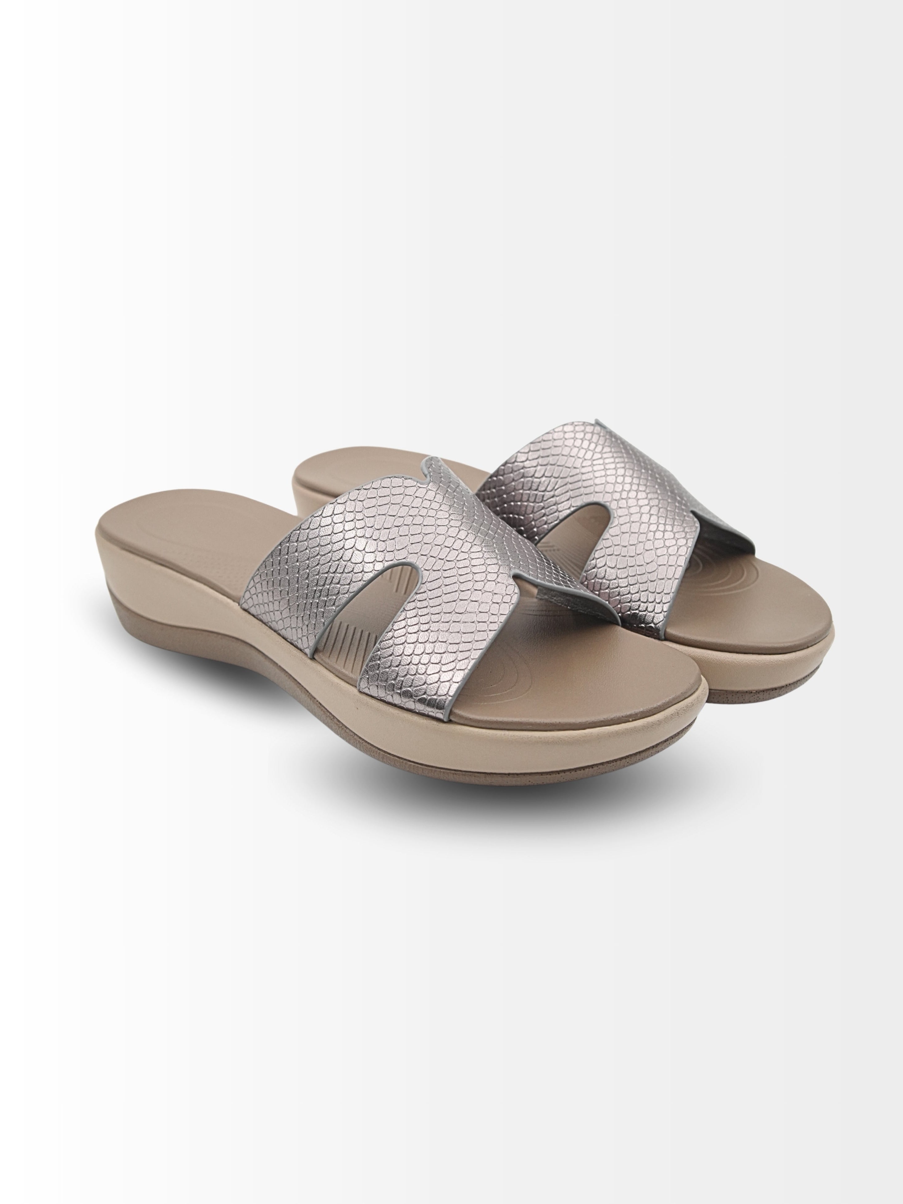 Pair of silver sandals on a white background