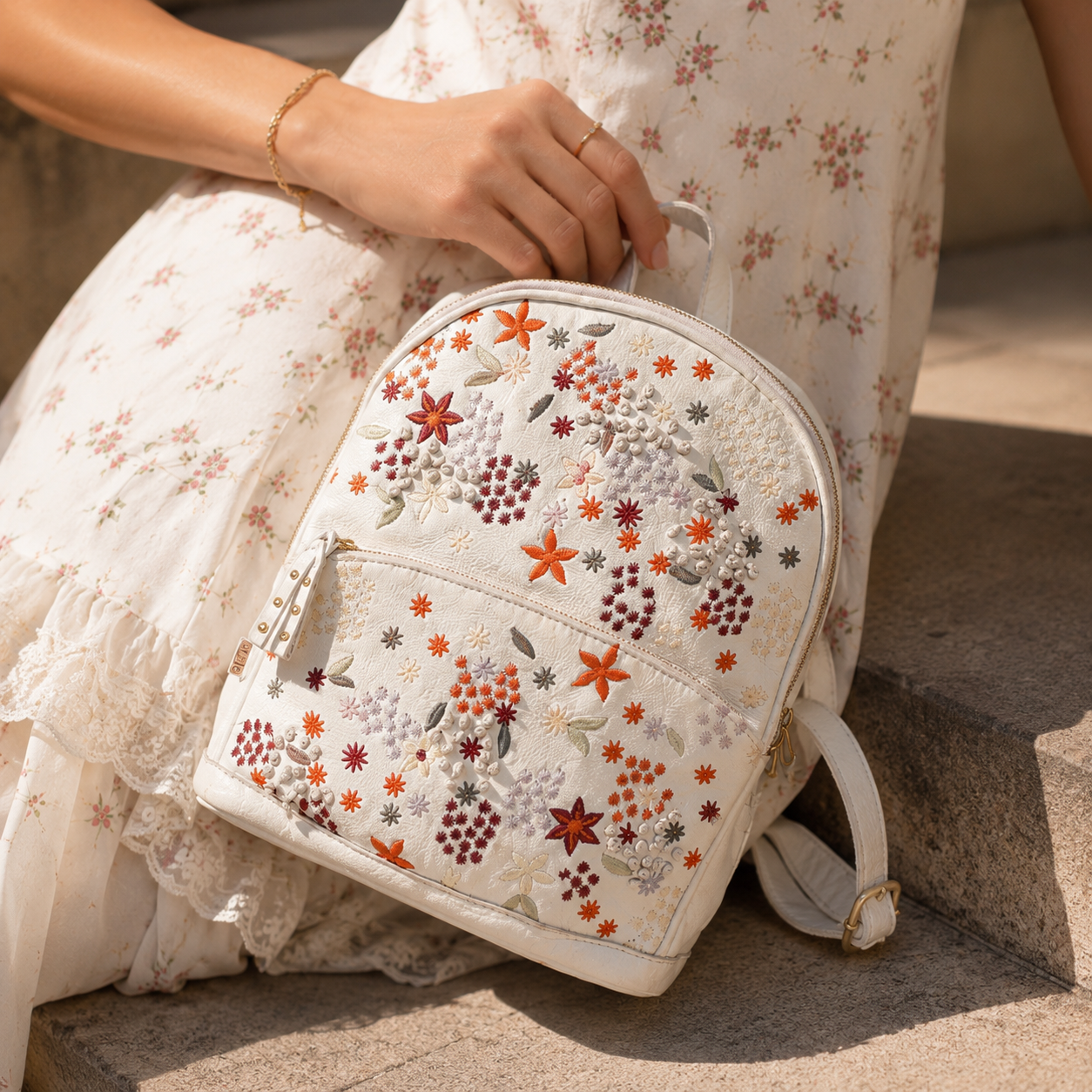 Floral Bliss: White Leather Backpack bag with Colorful Flower Embroidery