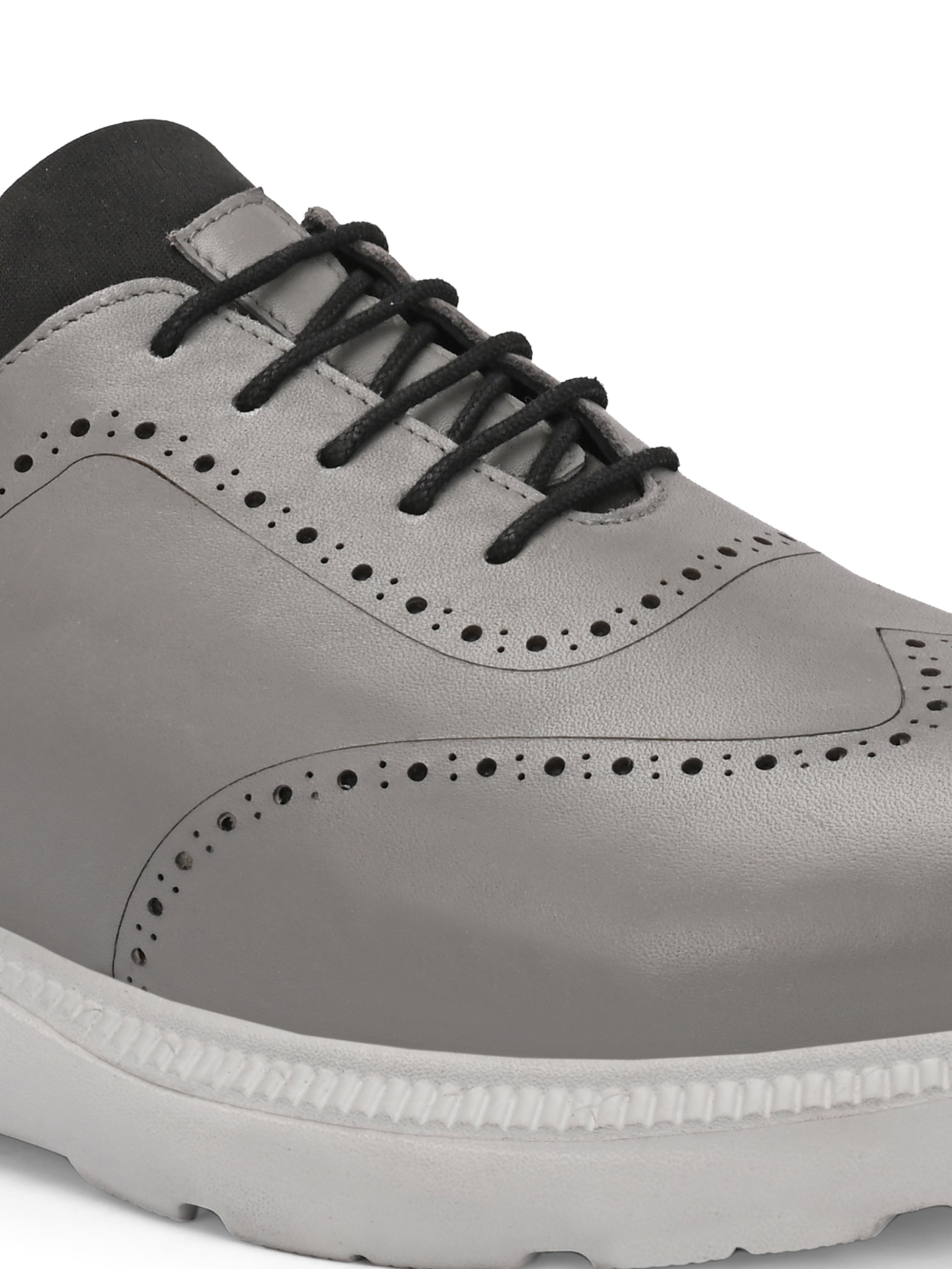 Trossard Cloud Leather Sneakers - The Heels India