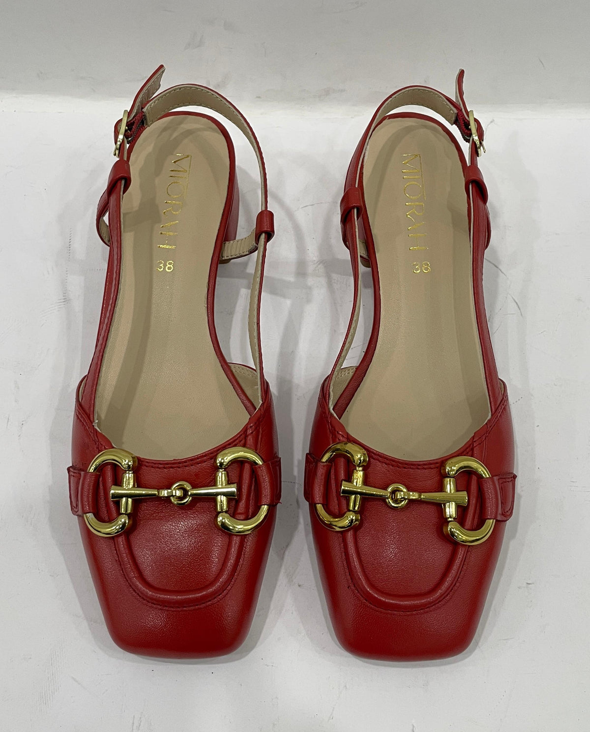 Majestic Red Leather Sling Heels On Feet - The Heels India