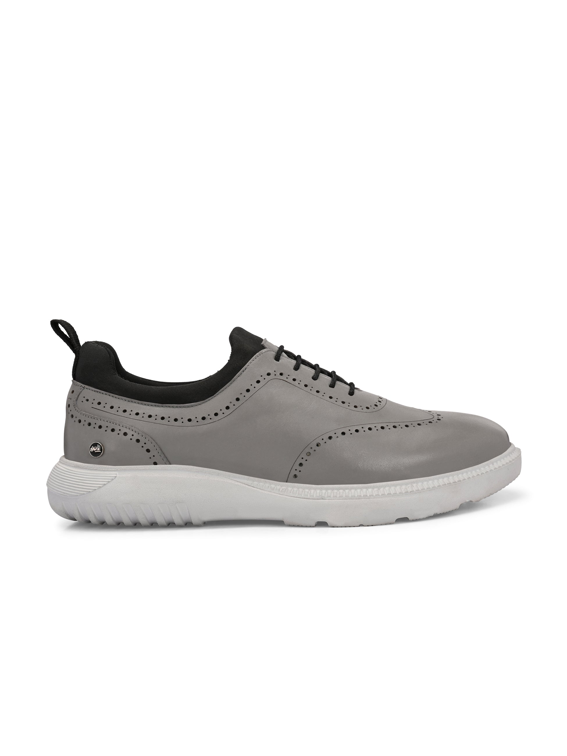 Trossard Cloud Leather Sneakers - The Heels India