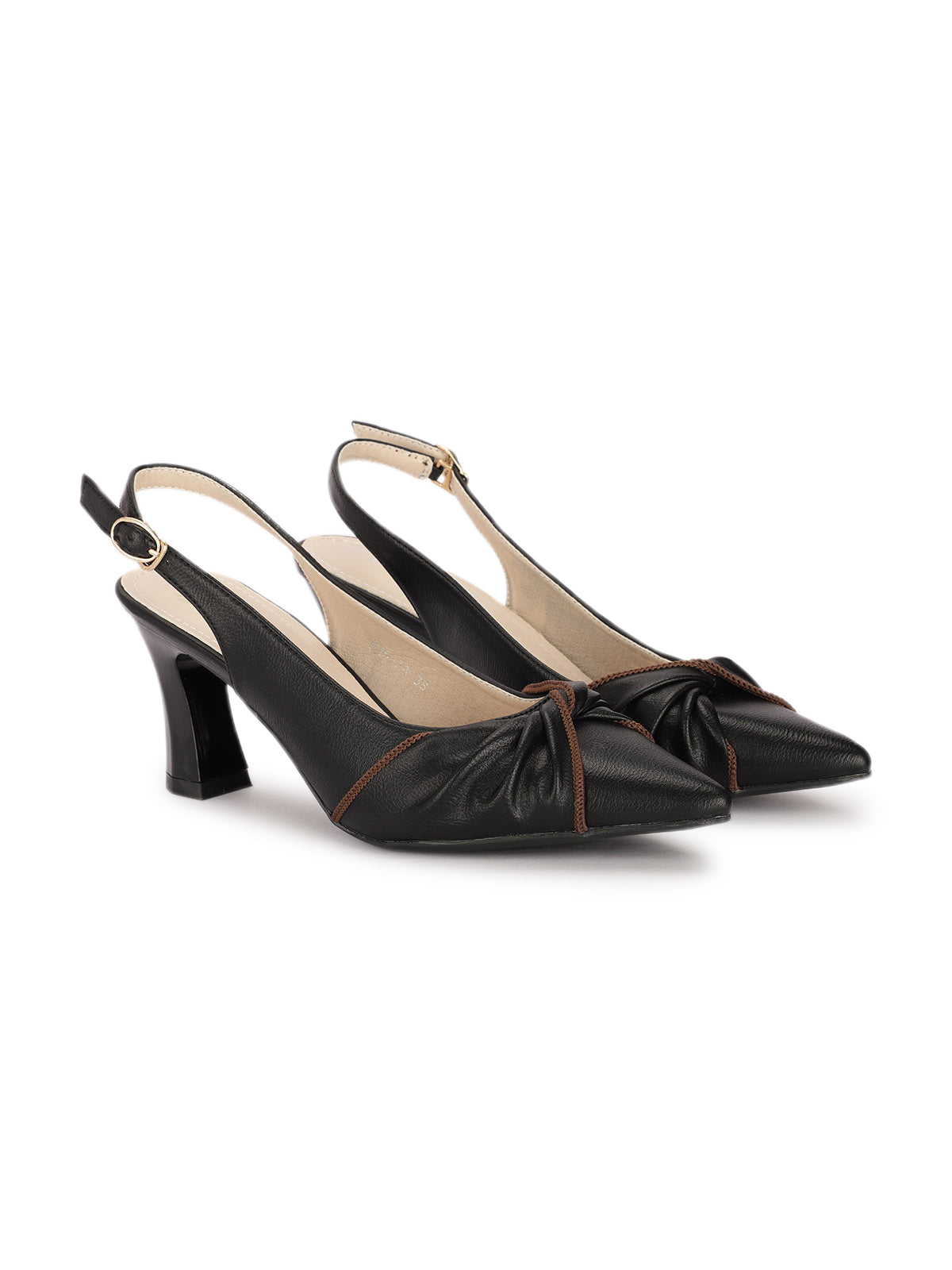 Black high-heeled shoes with bow detail on a white background