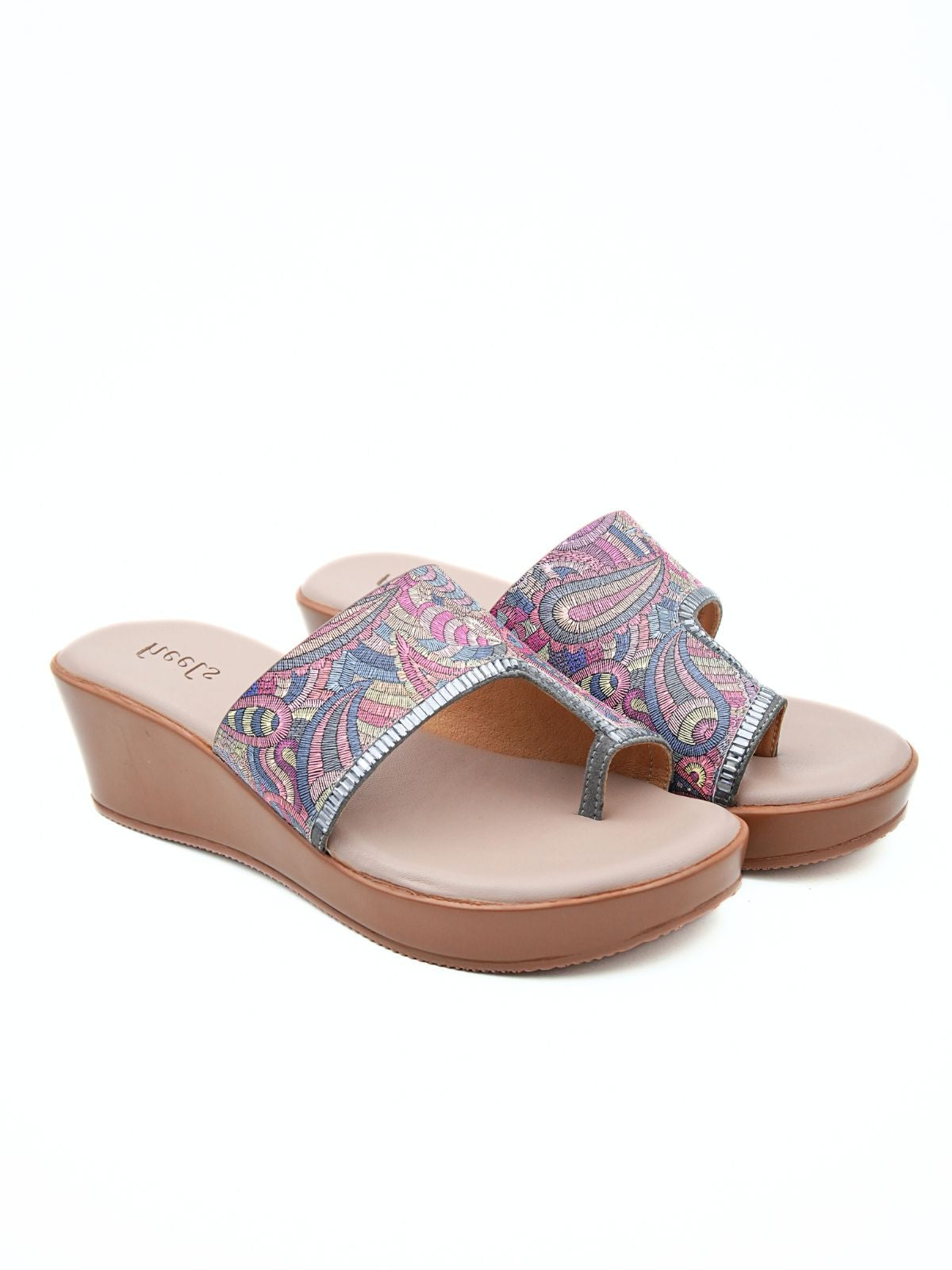 Pair of wedge sandals with paisley pattern on a white background