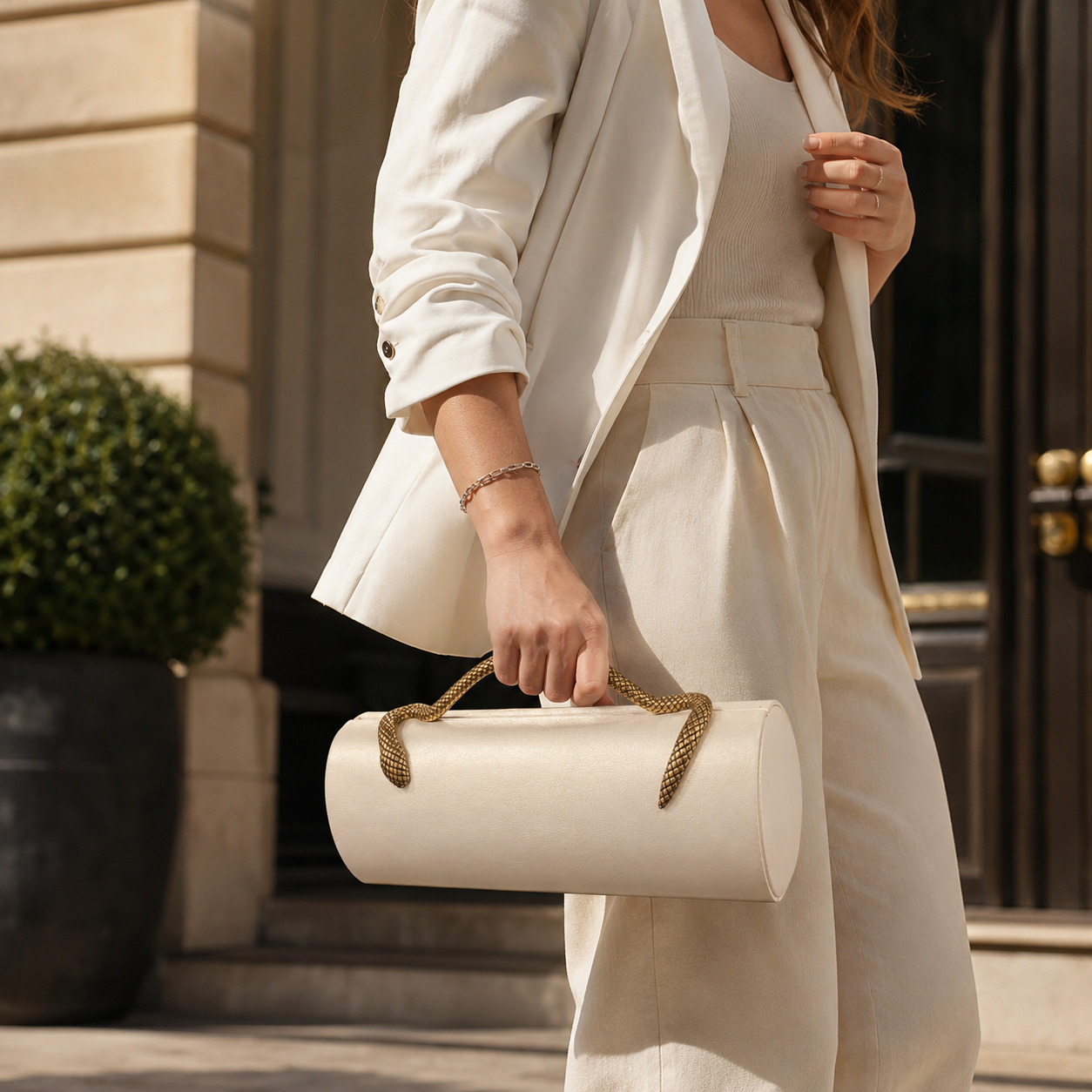 Metallic Snake Handle Clutch Bag