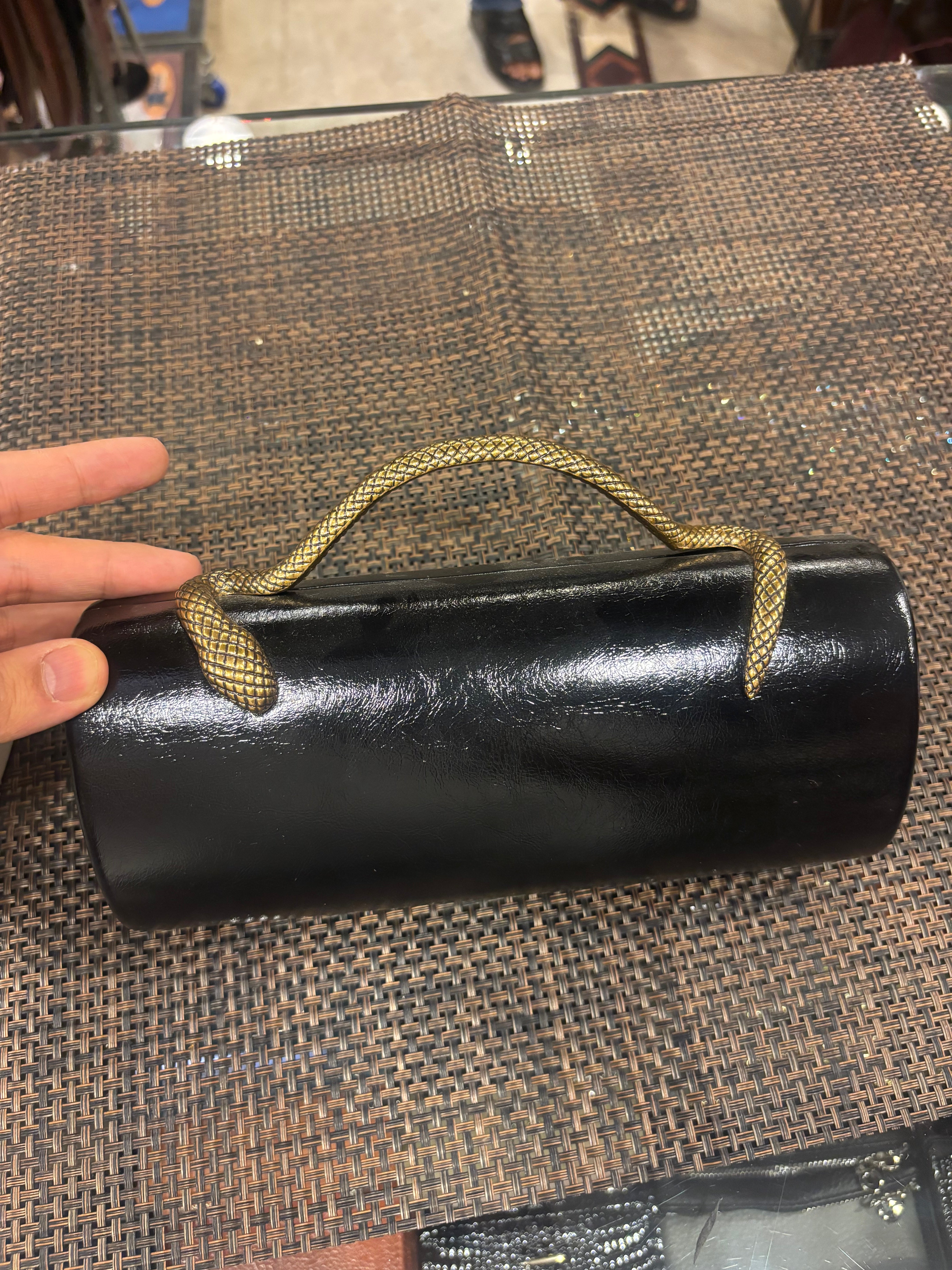 Metallic Snake Handle Clutch Bag