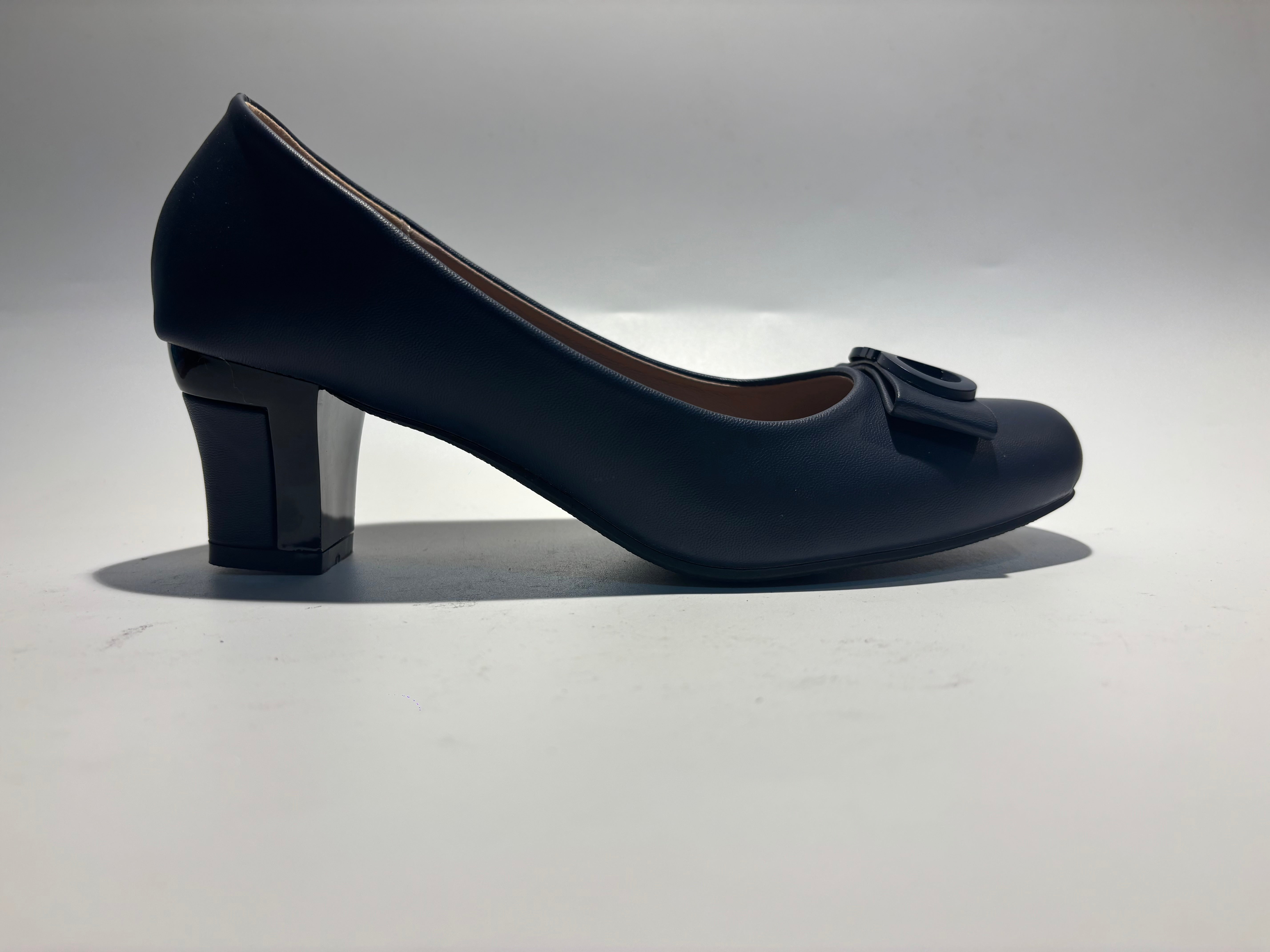 Rizza Bow Block Heels