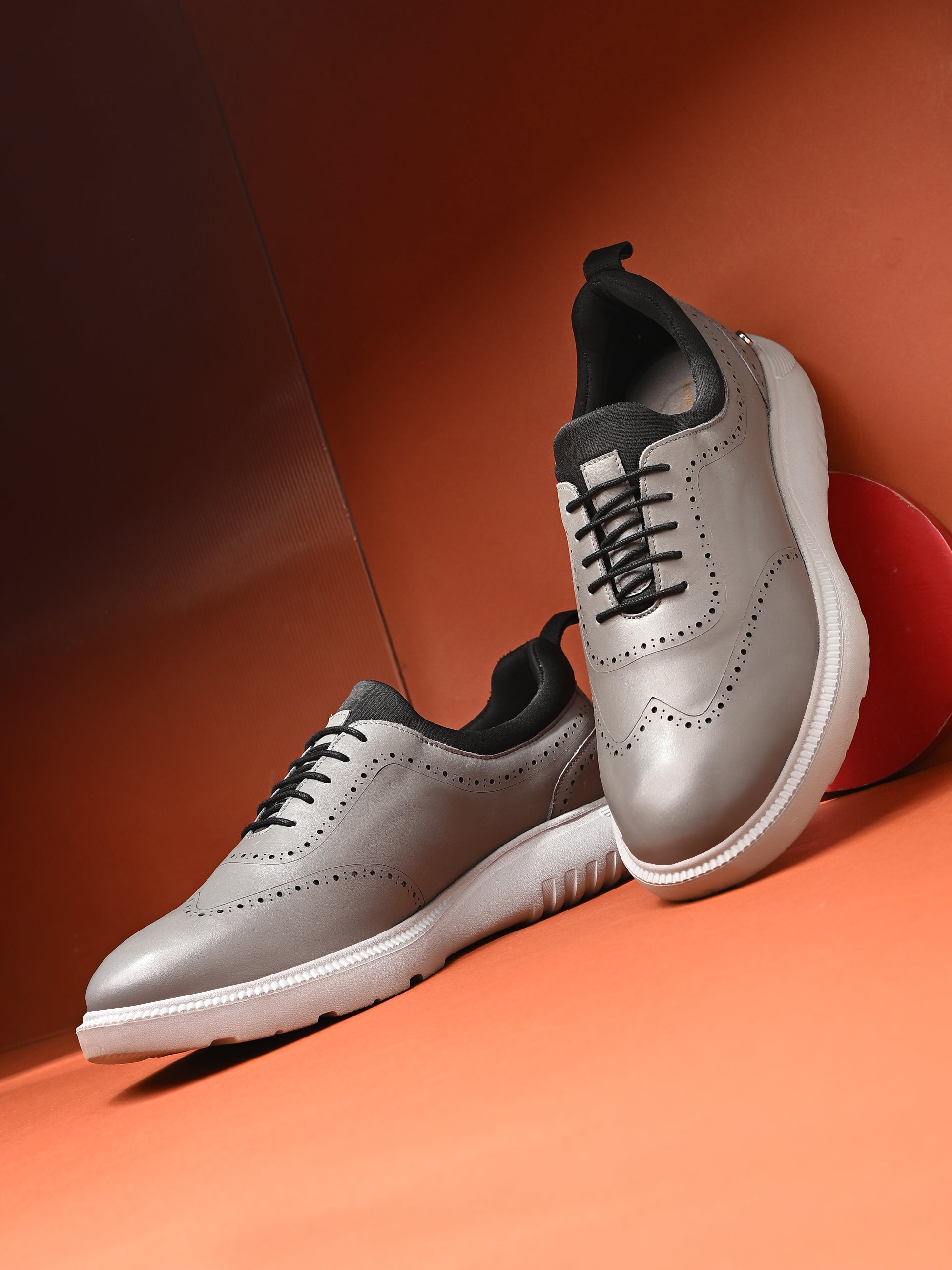 Trossard Cloud Leather Sneakers - The Heels India