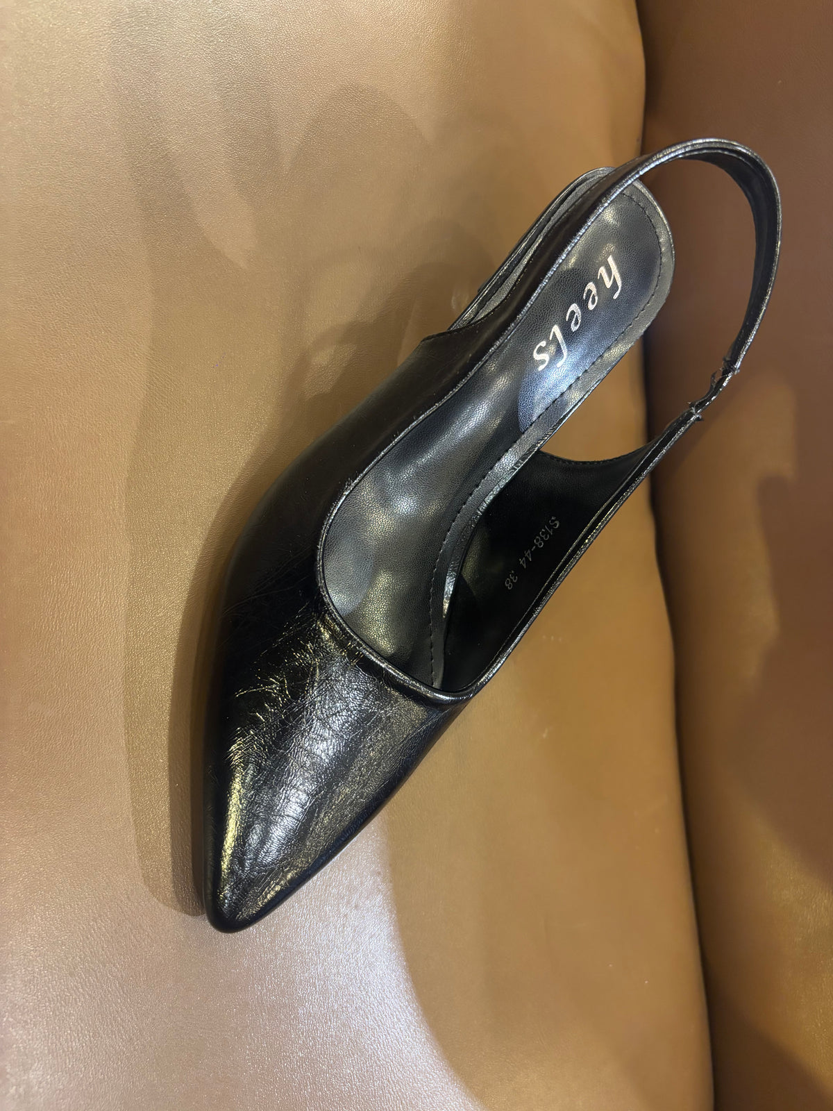 Noir Classic Slingback Pencil Heel Pumps in Black - The Heels India