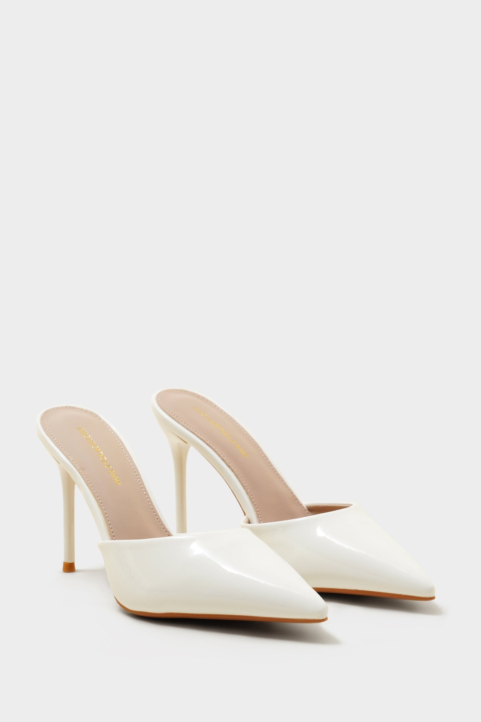 Sophia white pencil heels - The Heels India
