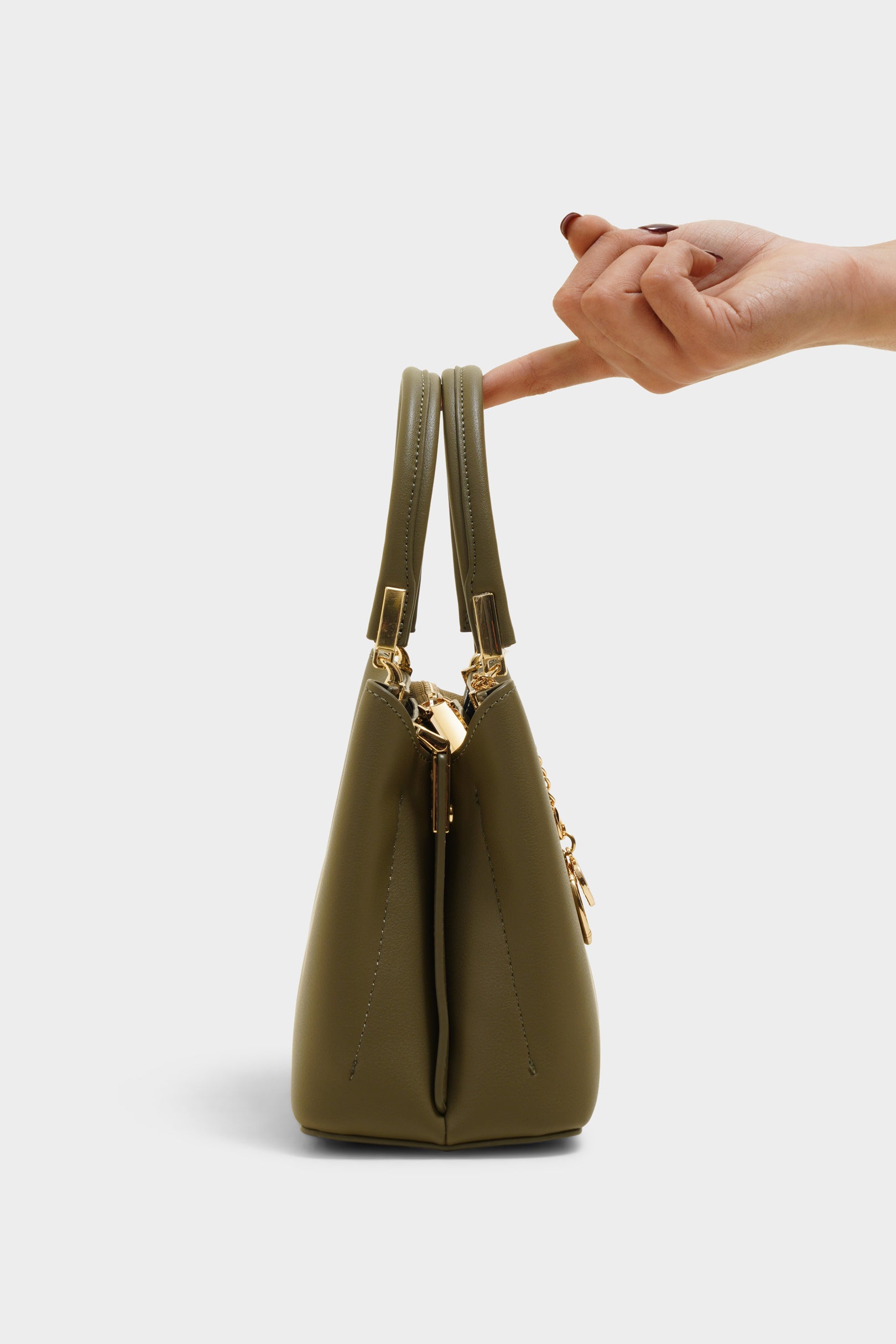 Paige olive green purse - The Heels India