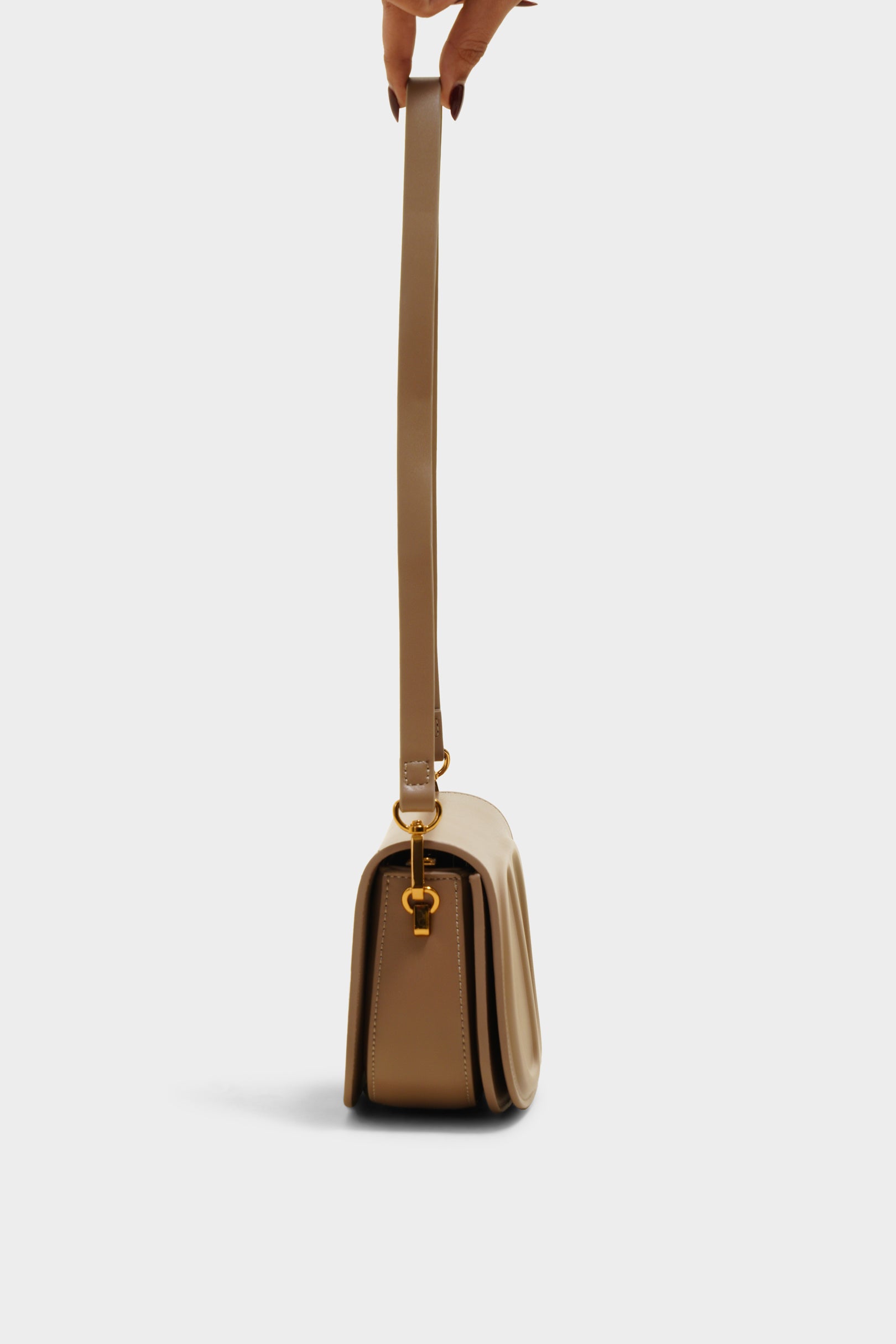 Lucy beige sling bag - The Heels India