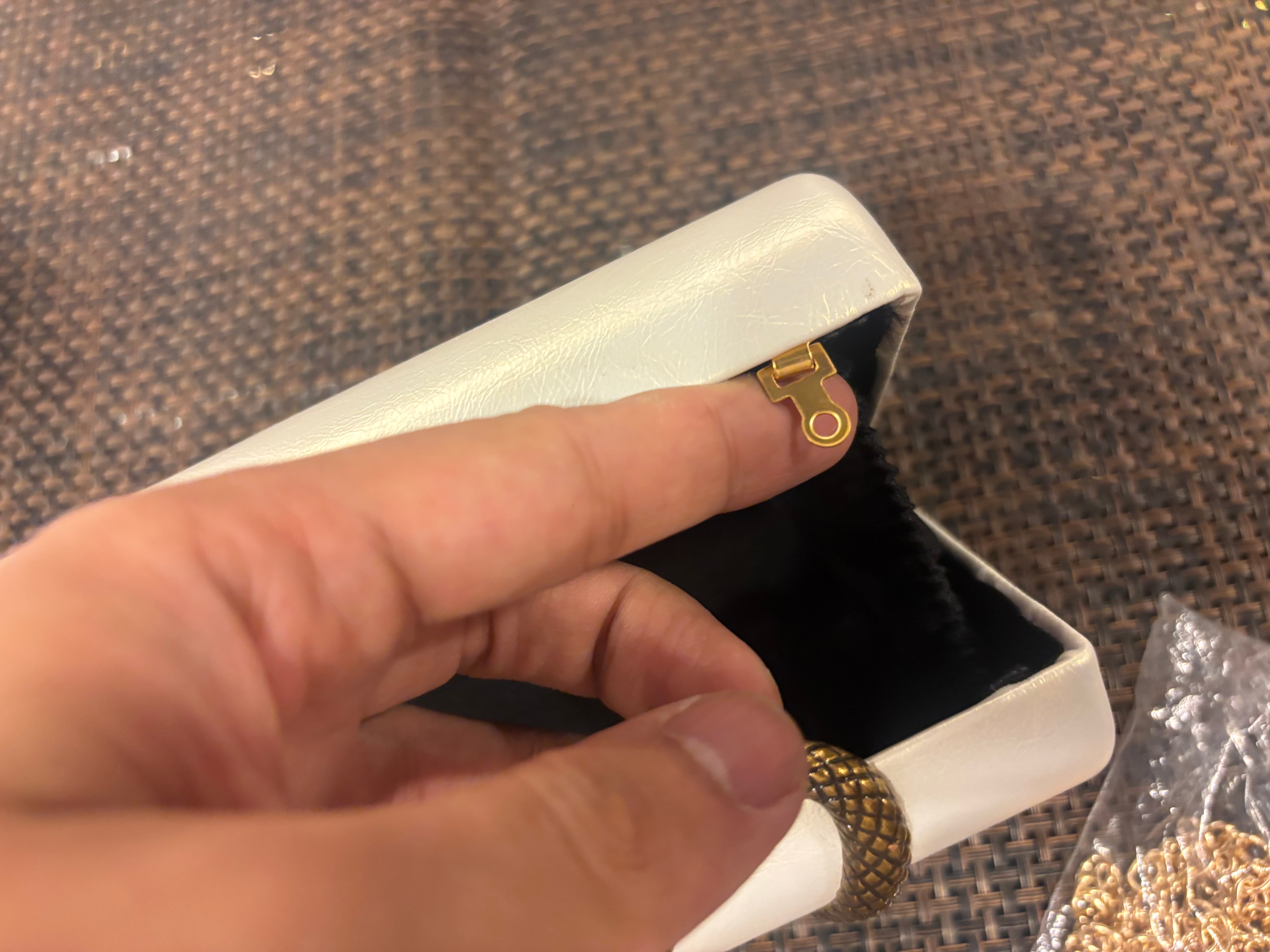 Metallic Snake Handle Clutch Bag