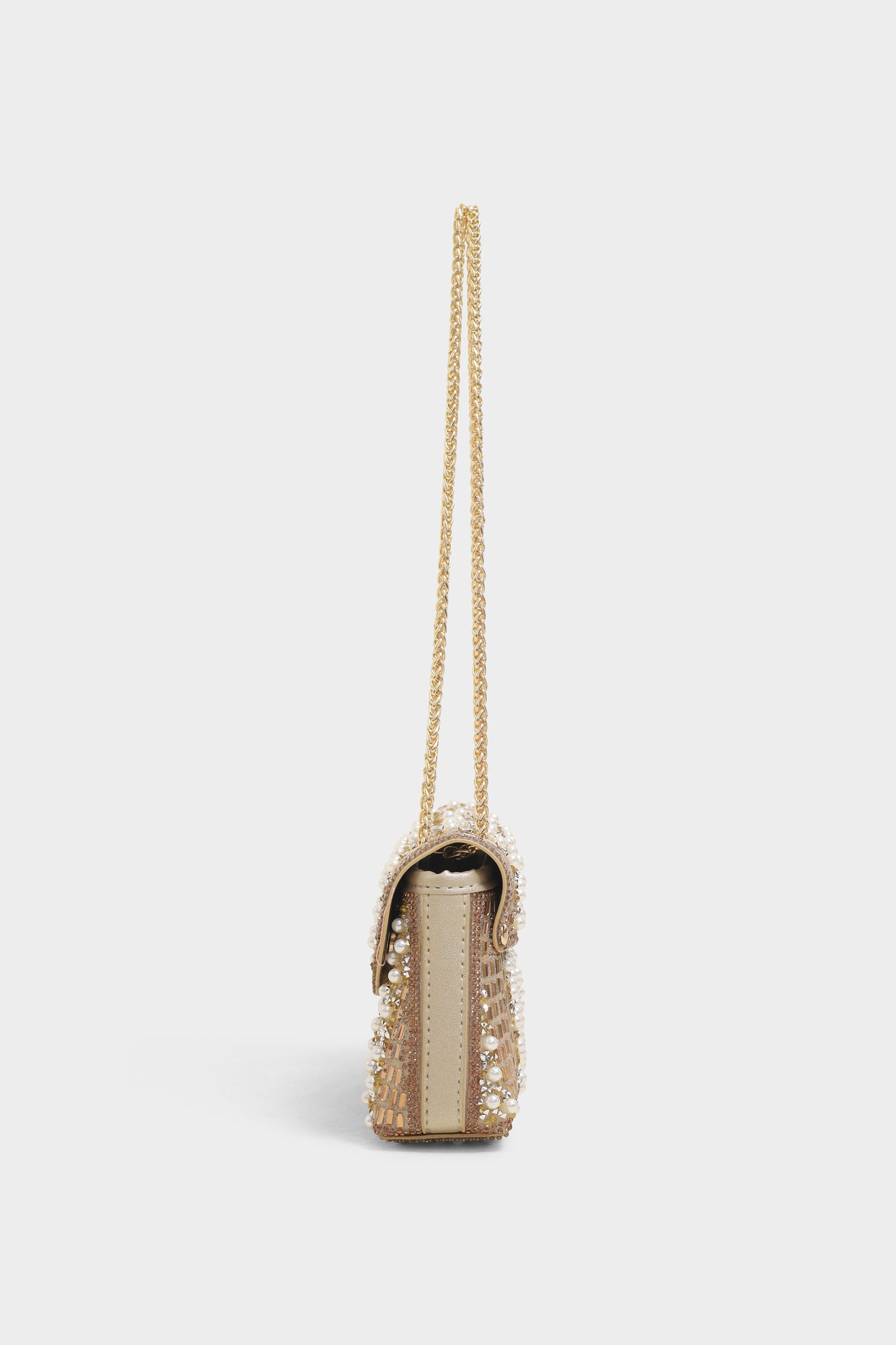 Ava golden sling bag
