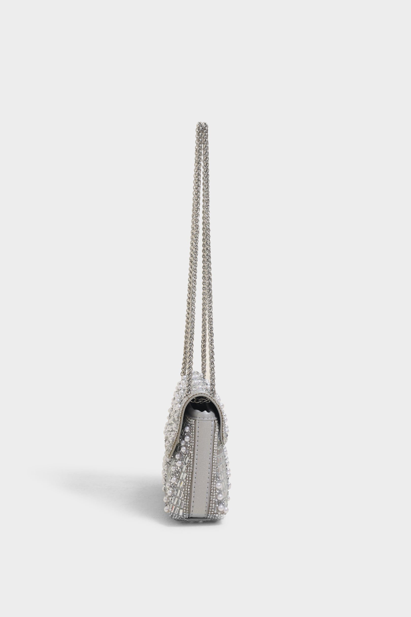 Ray silver sling bag