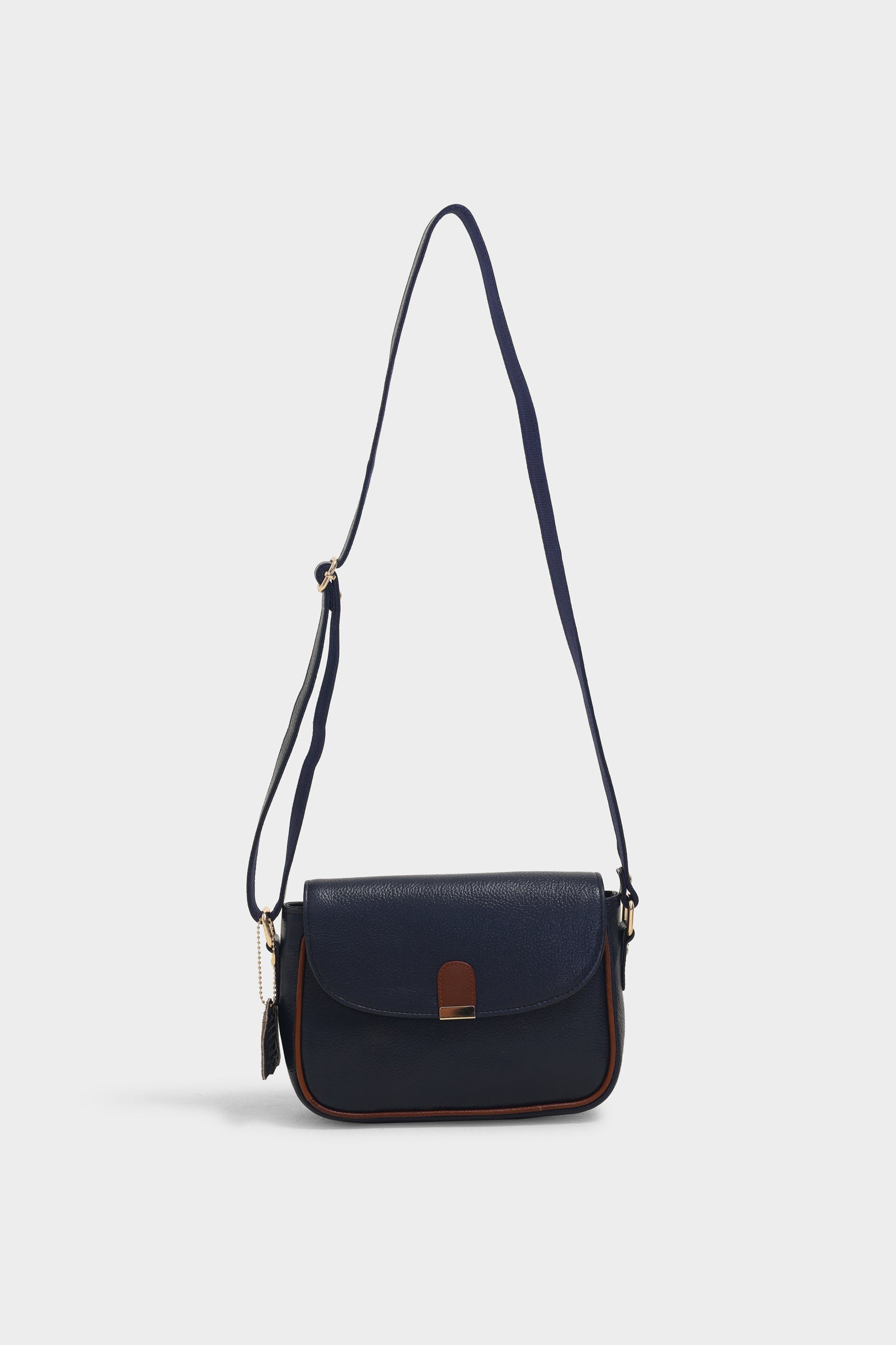 Faye blue sling bag - The Heels India