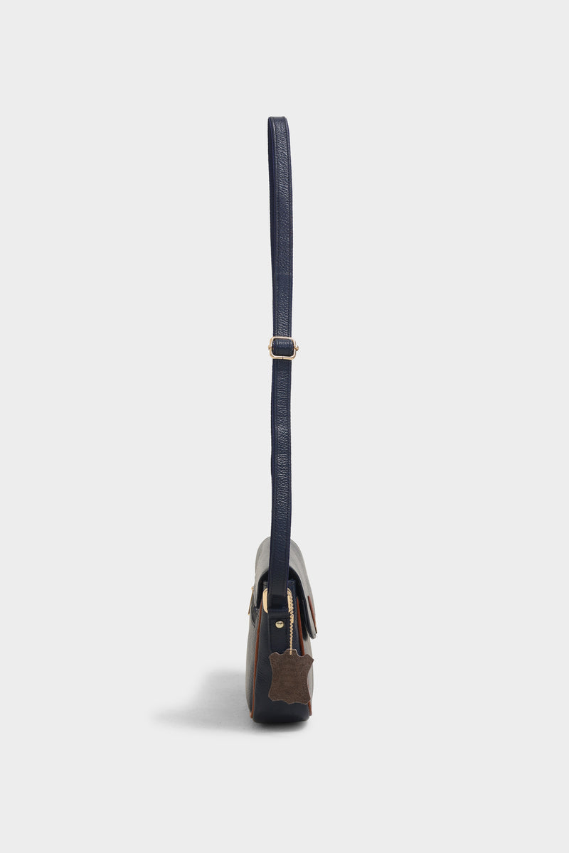 Faye blue sling bag - The Heels India
