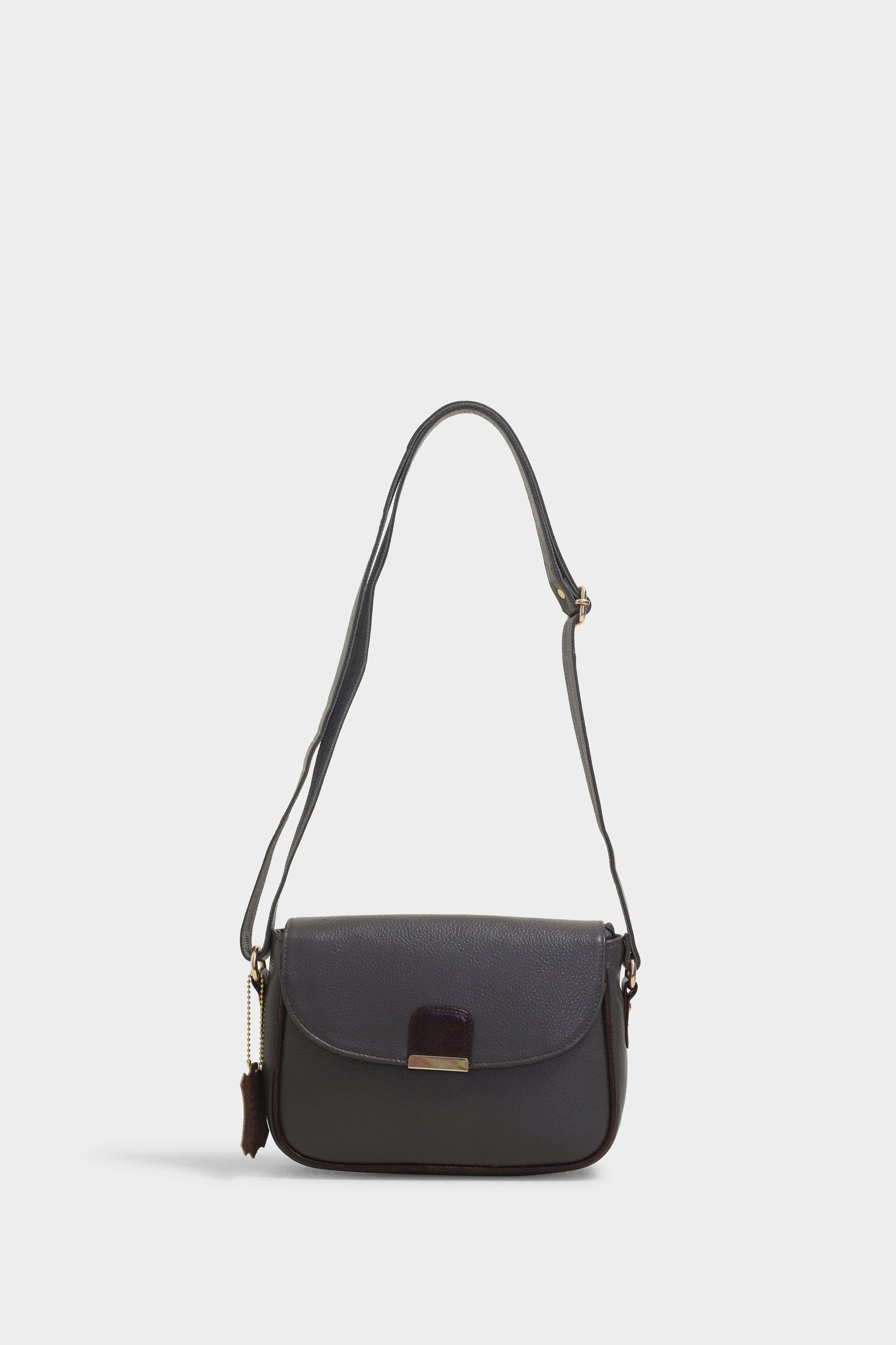 Vivy grey sling bag - The Heels India