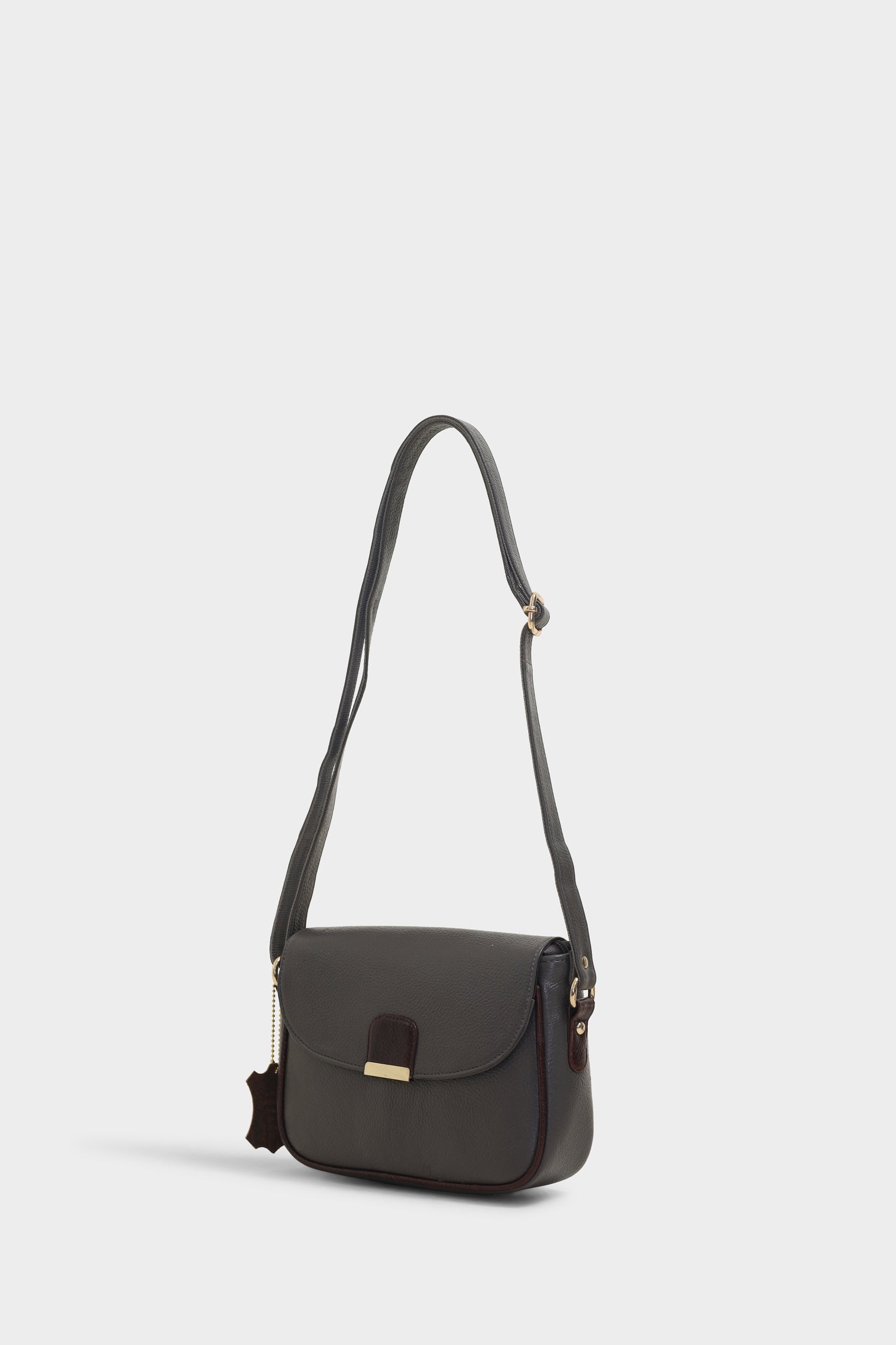 Vivy grey sling bag - The Heels India