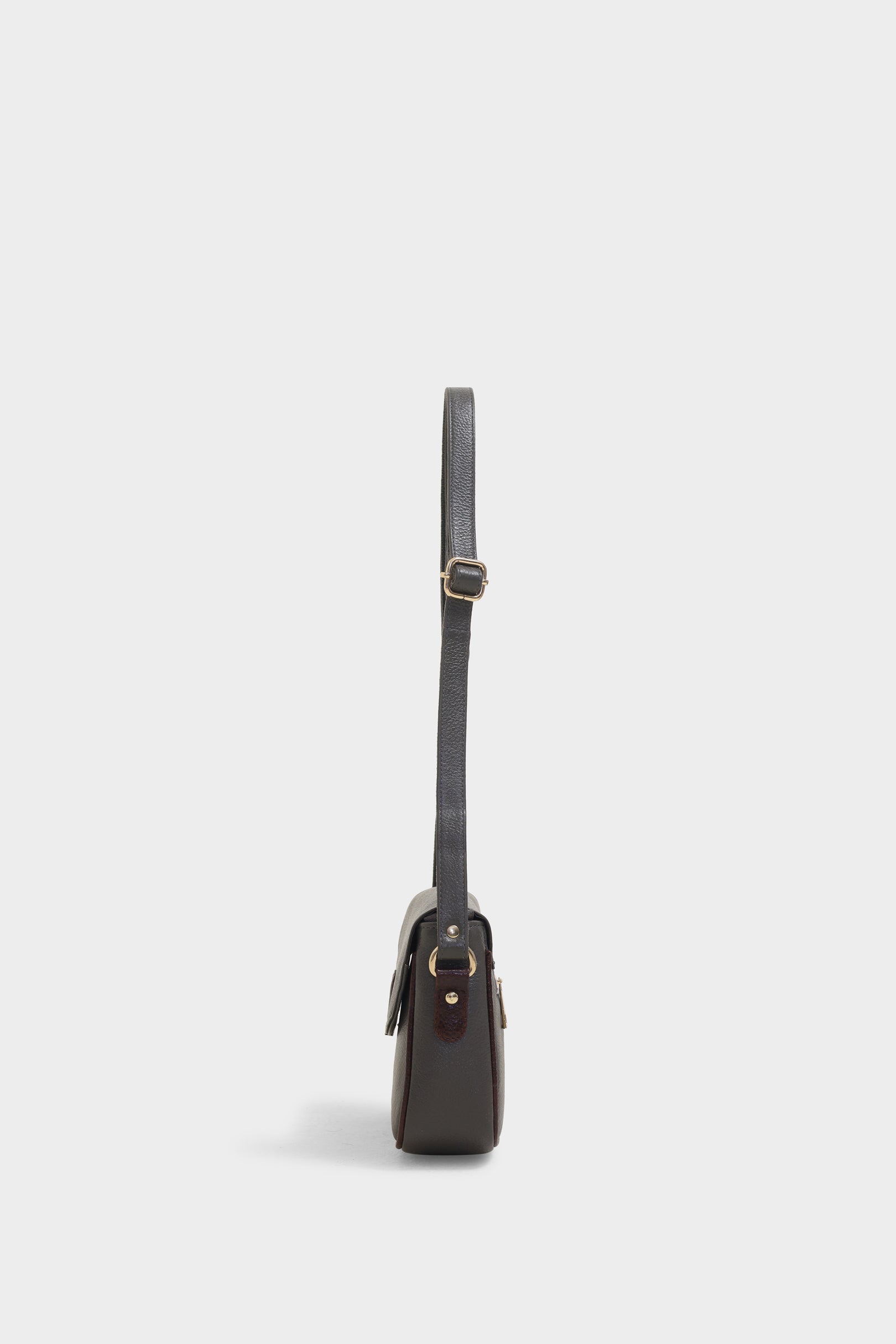 Vivy grey sling bag - The Heels India